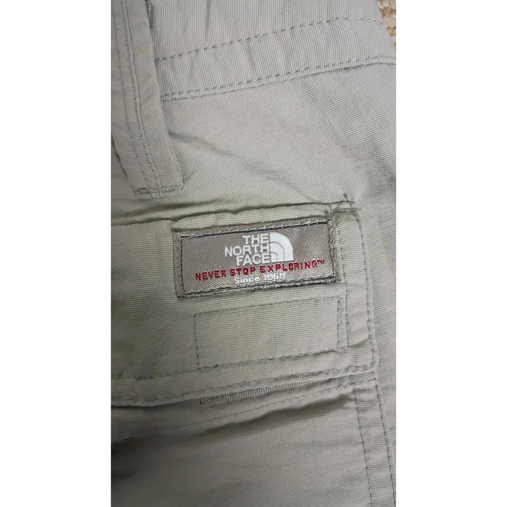 The North Face Vintage Convertible Pants Sz  34  Never Stop Exploring Tan Nylon